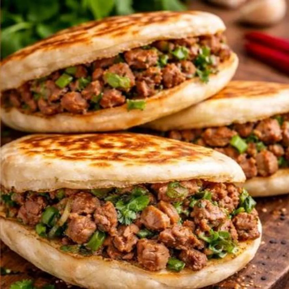 Flaky wheat bun with savory minced pork and cilantro at Jianbing Man (饼饼侠), a Chinese Restaurant in San Jose